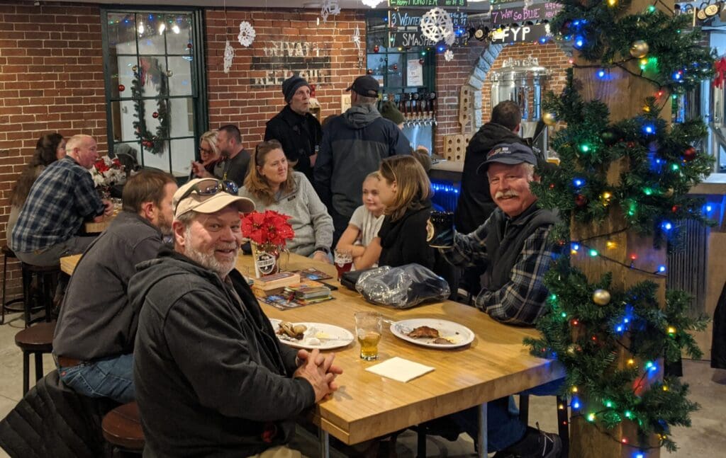 Friends After Gardens Aglow - Footbridge Brewery & BBQ Friends enjoying local craft beer at Footbridge Brewery after Gardens Aglow in Boothbay Harbor