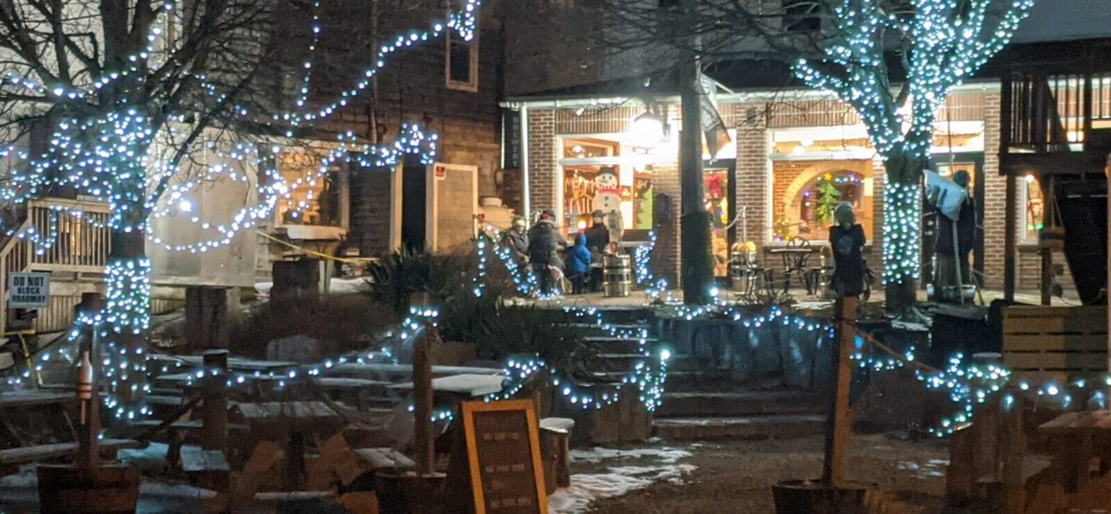 Welcoming lights to Footbridge Brewery near Gardens Aglow Boothbay Harbor Maine