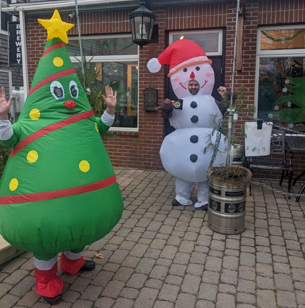 Gardens Aglow Photo - Footbridge Brewery & BBQ Guests taking photos at Footbridge Brewery Gardens Aglow special event for 0 gift card contest.